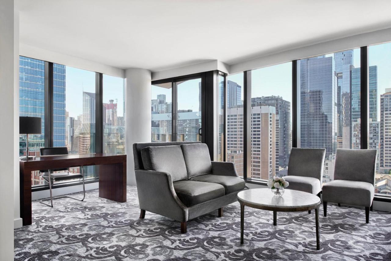 Sheraton Melbourne Hotel Extérieur photo A living room in a typical apartment